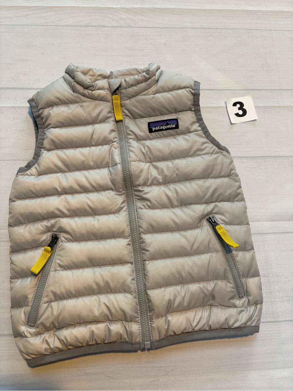 Patagonia Light Gray Kids Puffer Vest with Yellow Accents